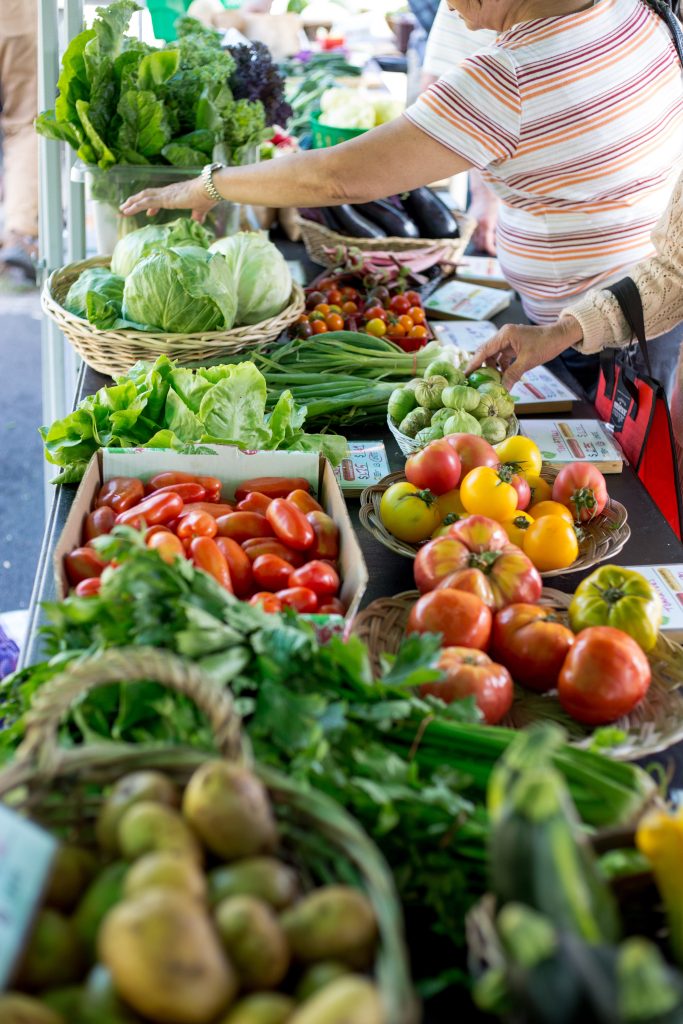 Community members shopping for fresh produce at one of The Depot's Good Food Markets.