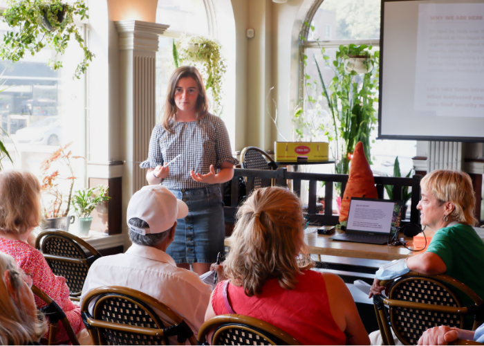 A social justice committee meeting where members build hope through community organizing